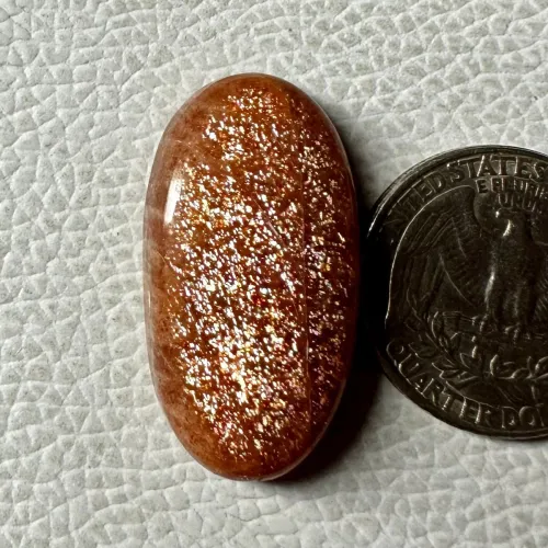 Comparison of feldspar gems: sunstone, moonstone, labradorite