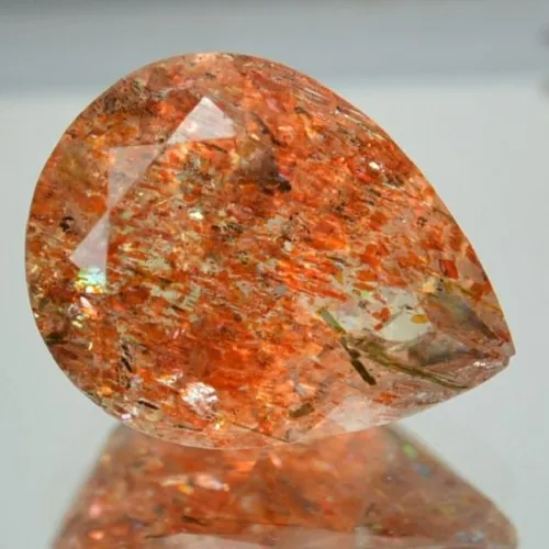 Comparison of sunstone varieties showing color and inclusion patterns