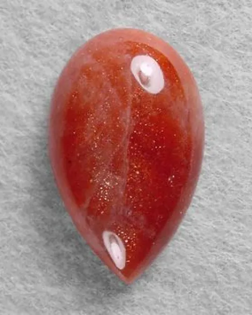 Microscopic view of copper inclusions in sunstone