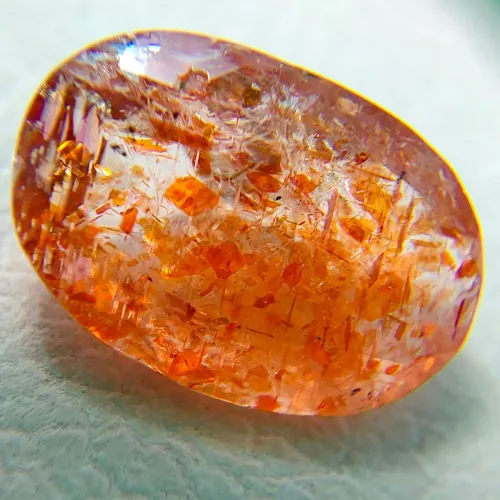 Microscopic view showing copper inclusions causing aventurescence