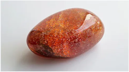 Close-up view of sunstone crystal structure revealing copper platelet inclusions