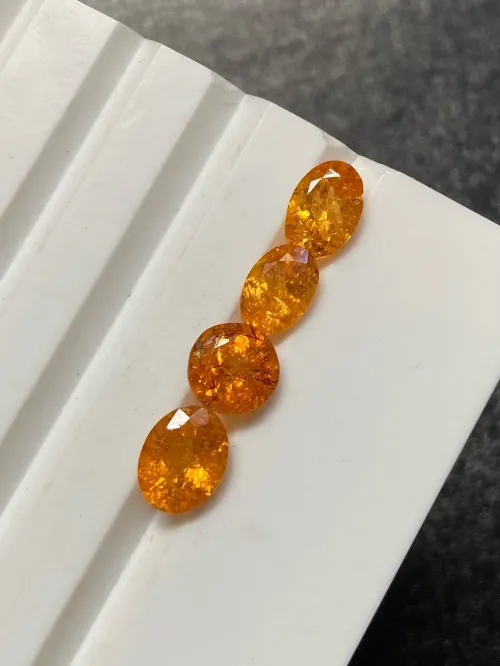 Sunstone cabochon exhibiting copper platelet flashes